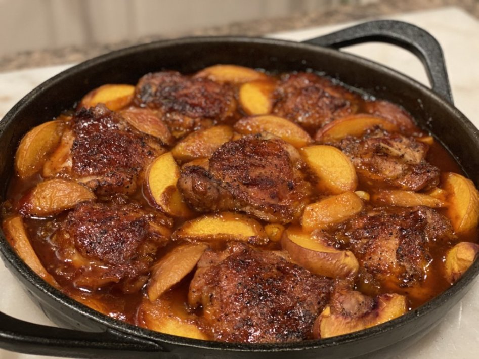 Ready to serve the barbeque peach chicken with peach sauce and fresh peaches. 