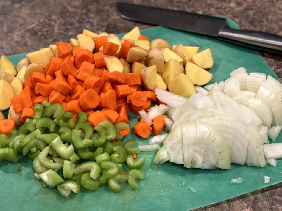 carrots, potatoes, celery, and onions chopped and ready to cook in the stew.