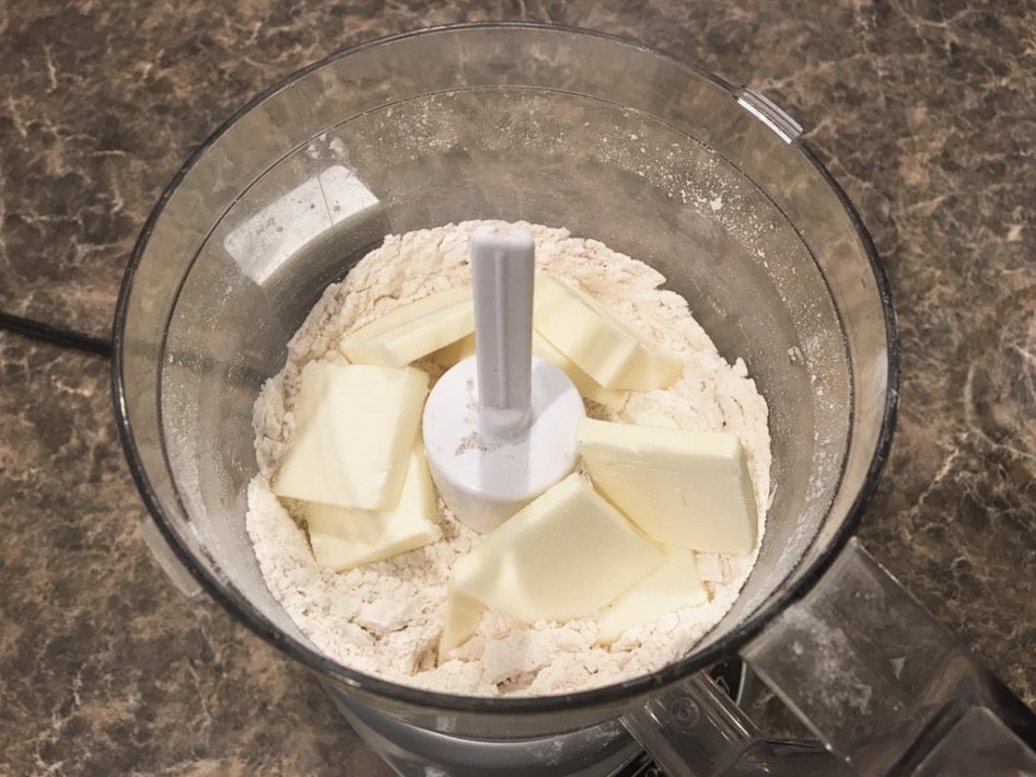 butter and dry ingredients in a food processor. 