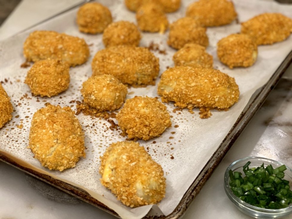 Chicken Croquettes fresh out of the oven on parchment paper