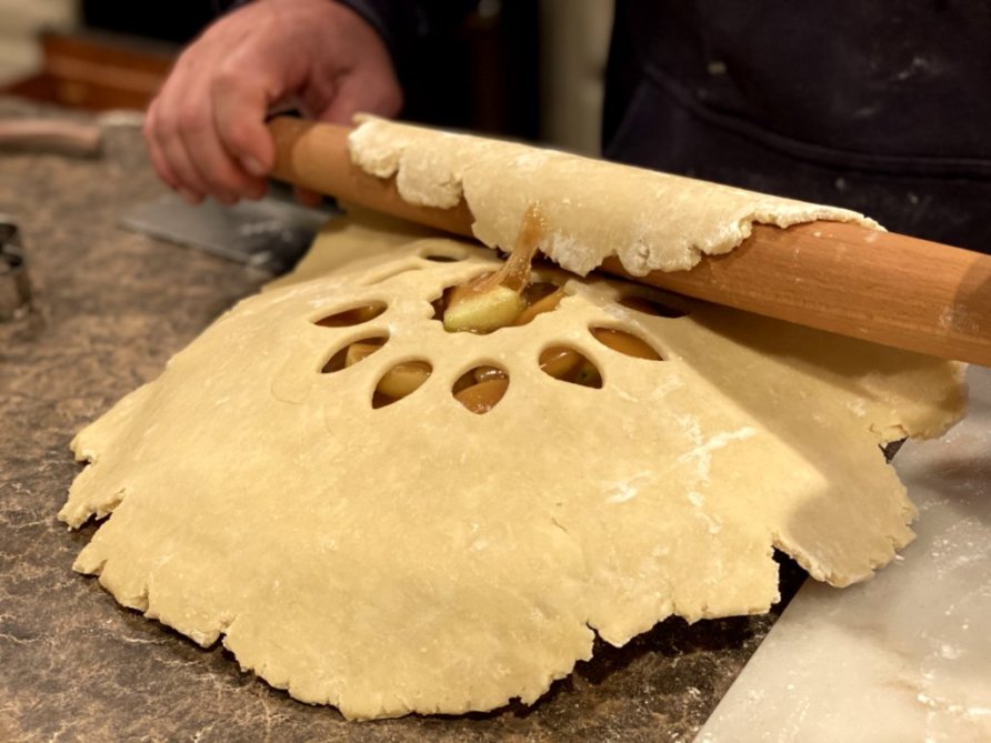 easy pie crust recipe rolled out onto the best apple pie