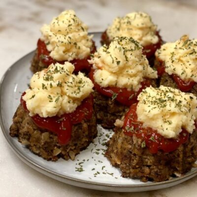 meatloaf cupcakes with mashed potatoes on top