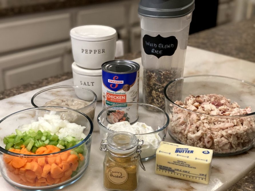 ingredients needed to make chicken and rice casserole with wild rice, vegetables, and cream of mushroom soup. 