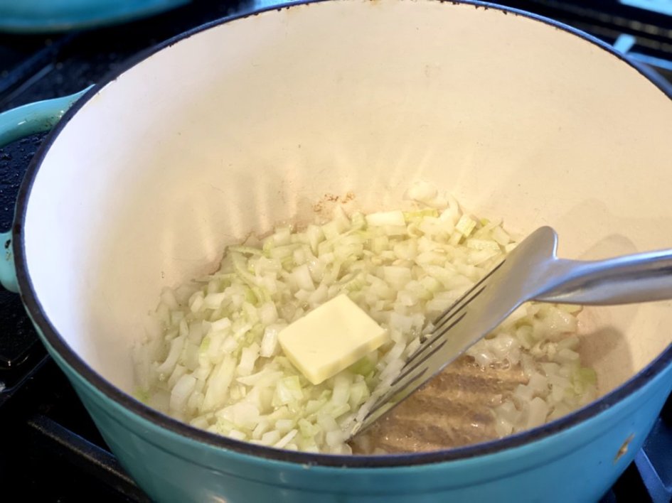 Cooking onions and celery in butter and olive oil.