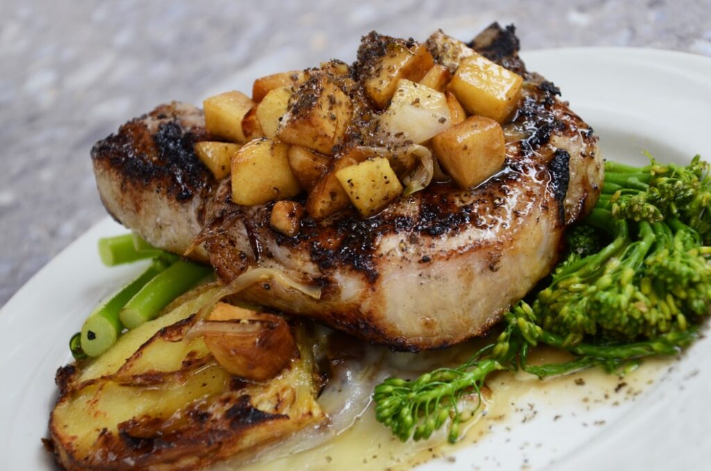 Recipe Categories Coogan's Kitchen seared pork chops with apples, potatoes, and onions with broccoli on the side. 