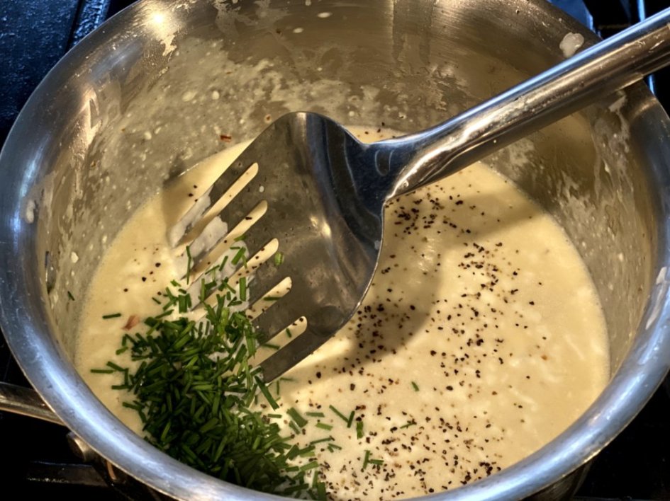 stir in the chives into the garlic cream sauce