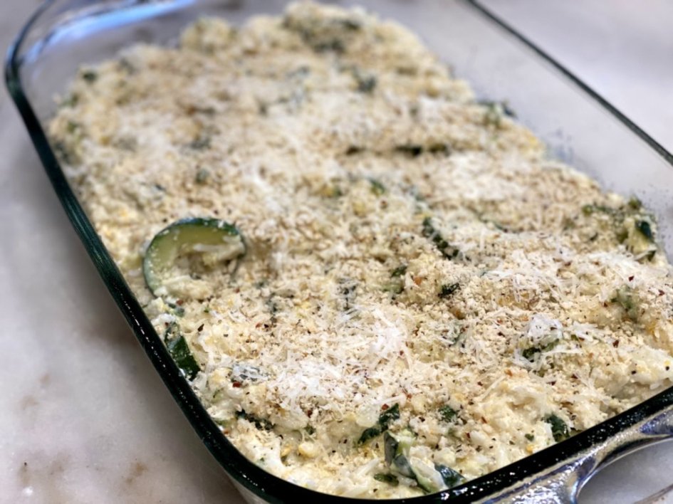 Spoon zucchini mixture into the prepared casserole dish to make this cheesy zucchini recipe - zucchini rice casserole recipe