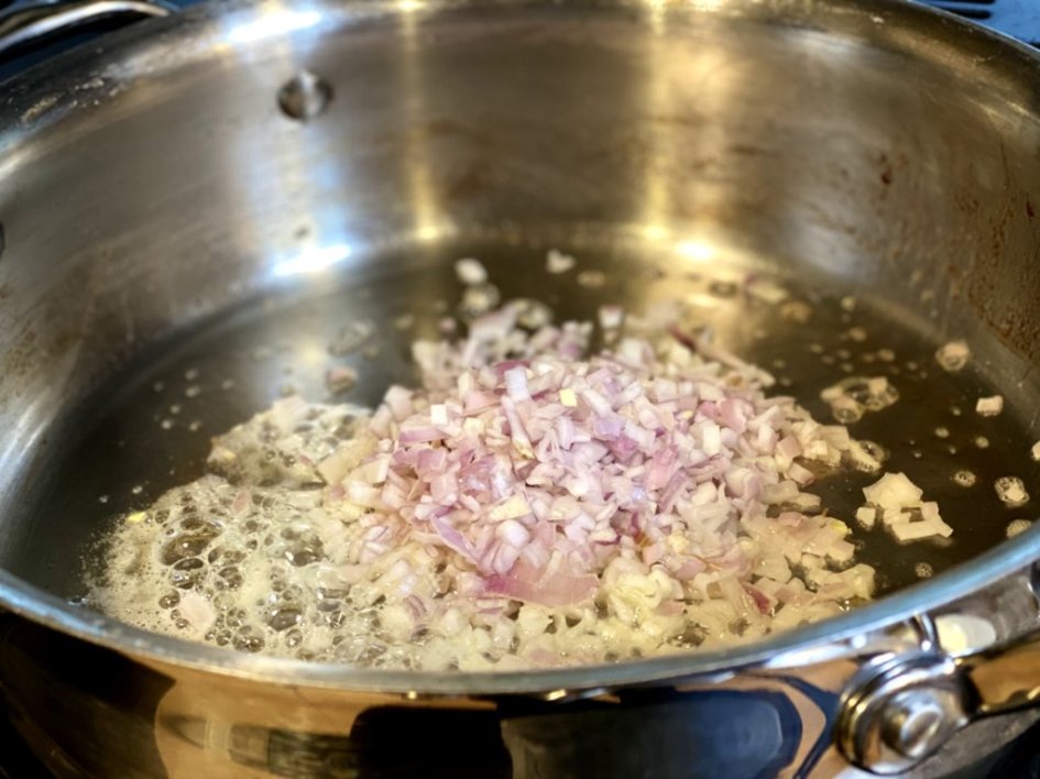chopped shallots sauteed in a hot pan over medium heat in butter. 