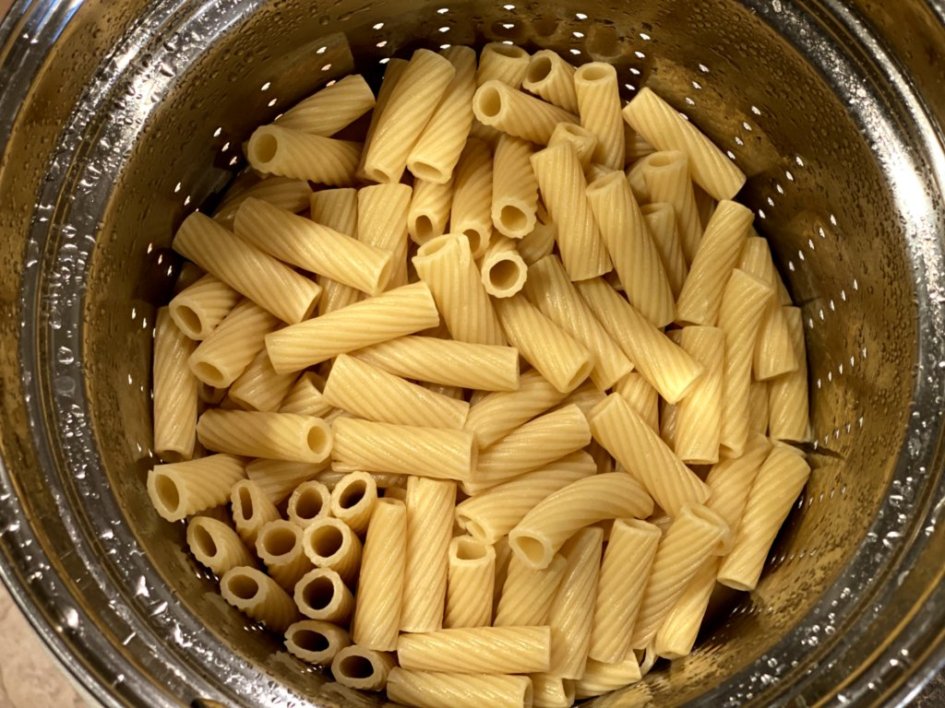 rigatoni or ziti pasta cooked and drained in a pasta pot