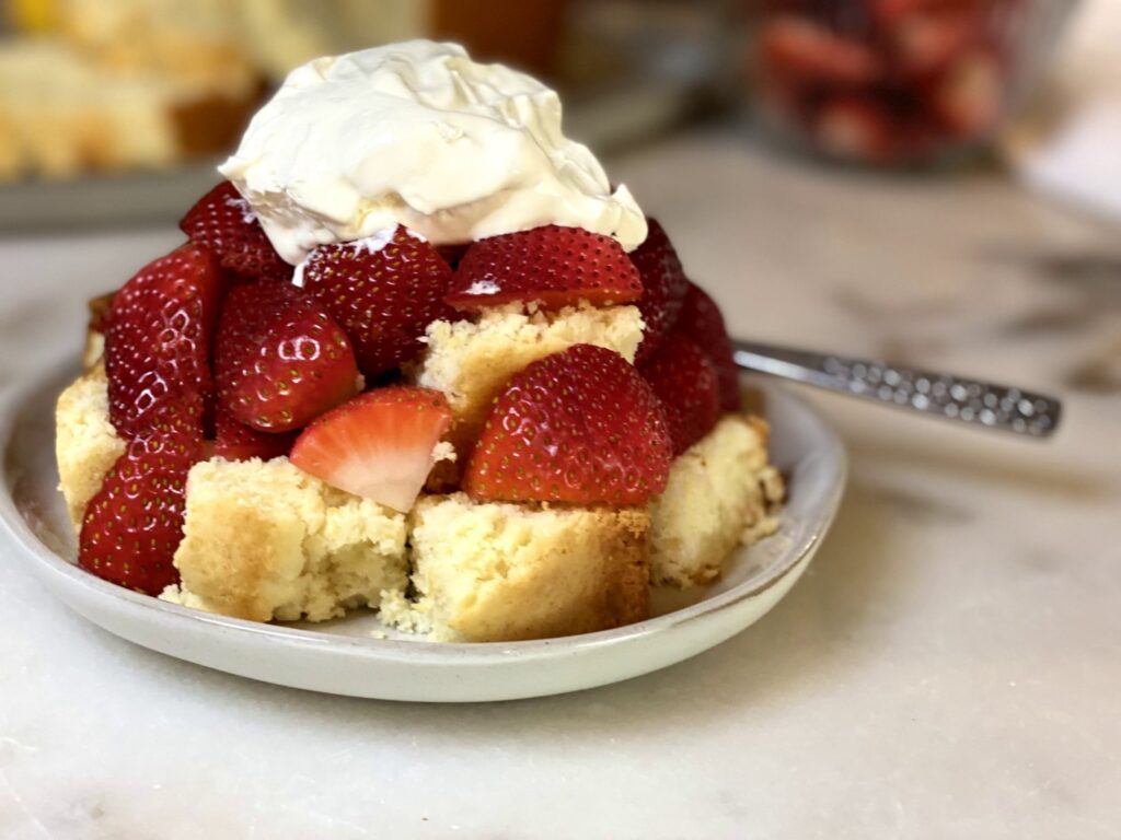 Lemon pound cake with strawberries and homemade whipped cream