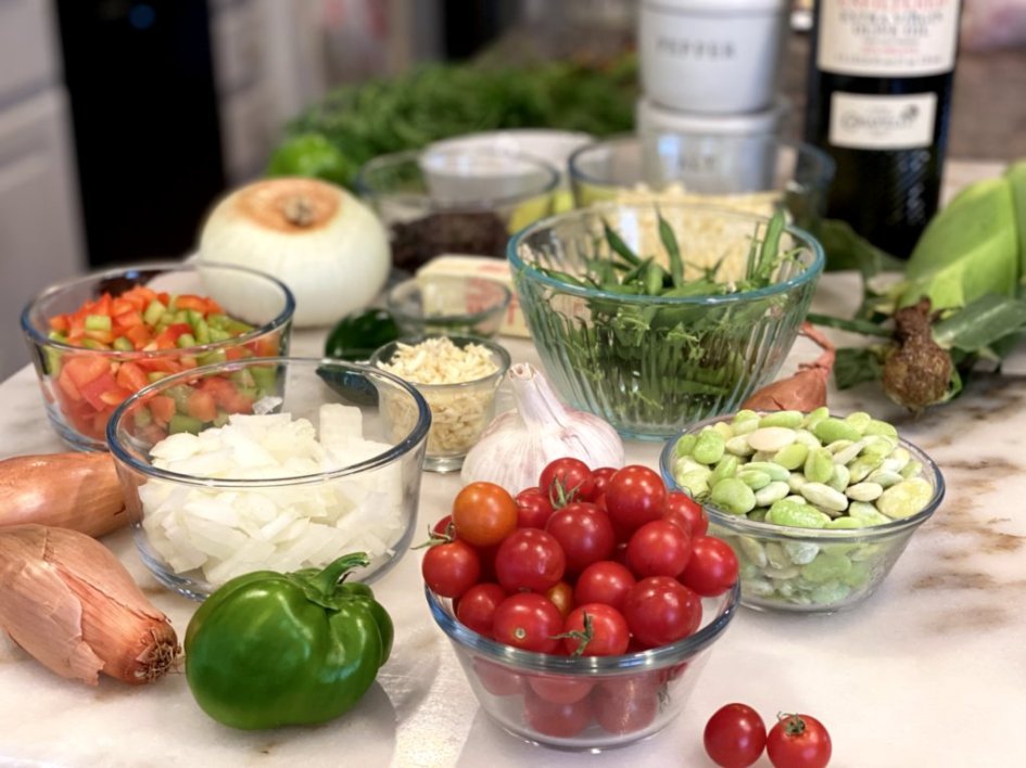 All the ingredients prepped in glass bowls ready to make an easy succotash side dish. 
