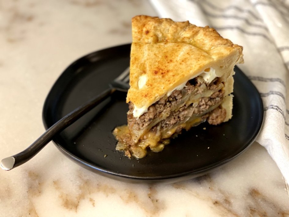 Meat and Potato Timballo Pie with ground beef, Italian sausage, potatoes, cheese, and baked in a delicious pie crust. www.cooganskitchen.com