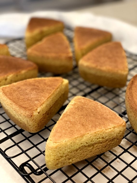wedges of sweet honey cornbread cooling on a wire rack cooganskitchen.com