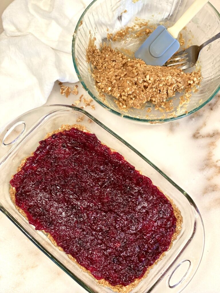 adding a layer of sweetened cranberries