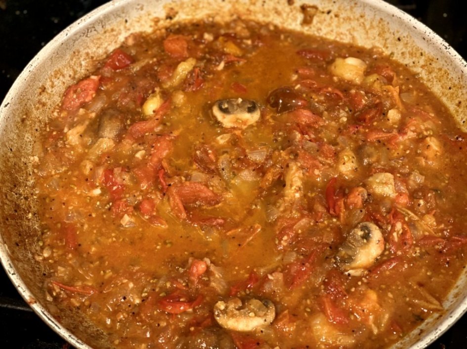 tomato sauce, mushrooms, oilive oil, garlic, and seasonings. 