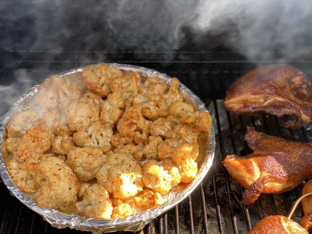 smoked cauliflower and chicken on the grill cooganskitchen.com